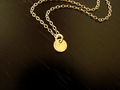 This beautiful 24k vermeil ( gold over sterling silver) disc measures 6x6mm , and floats freely on a gold filled chain, including a spring clasp in gold filled. Your item comes wonderfully boxed and wrapped so you can give it as a gift - or enjoy opening it as a gift yourself! Please note that gold filled jewelry and components have a much higher gold content, and are much more durable and tarnish resistant than gold plated. Gold filled jewelry is also a wonderful and affordable alternative to s Simple Handmade Gold Necklaces, Minimalist Gold Sterling Silver Coin Necklace, Simple Handmade Gold Necklace, Simple Gold Charm Necklaces, Simple Gold Charm Necklace, Gold Charm Necklaces With Round Pendant, Gold Charm Necklace With Round Pendant, Minimalist Handmade Gold Charm Necklace, Simple Gold Round Disc Necklaces