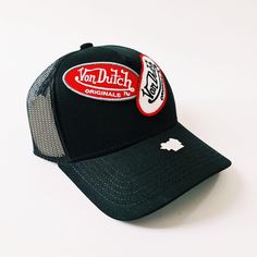 DEADSTOCK VON DUTCH CAP, STILL WITH TAGS AND ORIGINAL PACKAGING 100% AUTHENTIC, BRAND NEW WITH TAGS. Vintage black Von Dutch cap / Von Dutch Cap / Von Dutch trucker cap. White and red classic Von Dutch patches embroidered on front 90s Y2K Cap FULLY TRACKABLE SHIPPING SERVICE. UK AND WORLDWIDE SHIPPING. Black Curved Bill Baseball Cap For Travel, Black Trucker Hat For Travel, Black Curved Brim Trucker Hat For Travel, Black Trucker Hat Baseball Cap For Travel, Black Baseball Cap For Travel, Black Snapback Hat For Travel, Casual Black Snapback Hat For Travel, Black Travel Cap, Black Snapback Trucker Hat For Travel