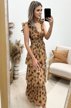 Indulge in romance with the "Story Of Us" dress. The brown maxi dress features a plunging neckline, fluttered and ruffled straps, and a gathered-wrapped front midriff for a feminine touch. With an open back and lower back invisible zipper, this dress is perfect for any occasion. 100% Polyester Runs small. Consider sizing up. Jaclyn is size 1, wearing a small. Brown Maxi Dress, The Story Of Us, Brown Maxi Dresses, Sky Collection, Color Wave, Mini Shirt Dress, Brown Floral, Lower Back, Plunging Neckline