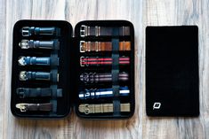 This high-quality modern travel watch band case can store a total of 12 watch bands, 6 on each side. A plush divider is provided to prevent scratches on the bands. The compact case is equipped with a zipper to safely transport your favorite bands or stacks of Monopoly money. Will the case fit Apple Watch bands or other smartwatch bands? Yes, it will! Available in I-am-fancy Orange or I-got-something-to-hide Black Tip-taupe Brown. Watch bands not included. Watch band case dimensions are 27.5 cm ( Modern Black Travel Watch, Portable Black Cases For Organization, Black Portable Cases For Organization, Black Cases With Pen Slots For Daily Use, Black Cases With Pen Slots, Black Travel Accessories With Luggage Sleeve For Organization, Functional Black Cases For Organization, Black Everyday Watch, Black Travel Cases With Pen Slots