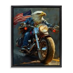 an eagle riding on the back of a motorcycle with american flag in the background framed canvas wall art print