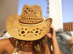 "Hats for women, bohemian hats, boho hats, cowgirl hats, straw cowboy hat, stetson hats, cowboy hats, straw hat, sun hat, buy online cowboy hats for women, sun hats, beach hats, custom hats & personalized hats for women. Jewelry & fashion accessories, original designs by kekugi. Best gift ideas !! This Stylish cowboy hat is accented with pompom ribbons This hat is soft yet supple, making it light to wear yet durable to last for years. These womens hats are perfect for any summer activity Western Straw Fedora Hat, Western Straw Hat With Wide Brim, Wide Brim Woven Straw Hat For Rodeo, Woven Wide Brim Straw Hat For Rodeo, Western Wide Brim Woven Straw Hat, Wide Brim Woven Sun Hat For Rodeo, Western Braided Brimmed Panama Hat, Western Wide Brim Straw Fedora, Western Braided Brimmed Straw Hat