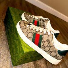 Brand New Comes With Extra Shoe Laces Two Dust Bags Stylist And Fashionable Us 8.5: Eu 39 Alessandro Michele And His Team Must Have Really Clocked Up The Hours Looking Through Gucci's Archives - These New 'Ace' Sneakers Are Made From Coated-Canvas Which References The 'Gg Supreme' Print From The '30s. They're Trimmed With Canvas Stripes Matched By Coordinating Metallic Watersnake Heel Tabs And A Strip Of Red Leather At The Tongue. They're Far Too Cool To Cover Up So Keep Your Hemlines Cropped. Beige Sneakers, Gucci Sneakers, Gucci Monogram, The Hours, Alessandro Michele, David Beckham, Gucci Shoes, Womens Shoes Sneakers, Red Leather