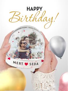 someone is holding up a birthday card with the message,'happy birthday mert seda '