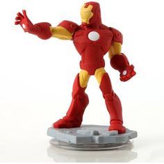 an action figure is posed on a white surface with its arms outstretched in the air