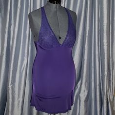 Victoria's Secret Chemise / Slip Dress Very Sexy Collection New With Tag Attached Size: 36c Color: Eggplant Purple So Silky Soft You Will Feel Beautiful Wearing This. Multiple Purpose As A Slip Dress Under Neath Clothing Or As A Sexy Nglige On Its Own. Fminine Halter Style Bodice Lighlty Lined With Lace Mesh. Features Lined Underwire Cups For Support. Vs Hanging Charm Topped With Bow Front & Center. Adjustable Straps Criss Crossed & Opens Up To Show Off Your Sexy Back. Transparent Floral Lace De Fitted Slip With Built-in Bra For Night, Elegant Fitted Backless Sleepwear, Fitted Camisole Mini Dress For Night, Fitted V-neck Party Chemise, Fitted V-neck Chemise For Party, Elegant Fitted Purple Sleepwear, Elegant Purple Fitted Sleepwear, Fitted Purple Sleepwear With Built-in Bra, Sheer Fitted Chemise For Night