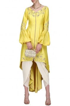 Shilpa Reddy Featuring a lemon yellow front open asymmeterical zipper tunic in silk base with bell sleeves and floral embroidery. It is paired with matching dhoti pants in crepe. Shilpa Reddy, Mom Daughter Outfits, Dhoti Pants, Desi Fashion, Abaya Fashion, Indian Designer, Kaftan Dress, Indian Designer Wear, Lemon Yellow