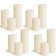 six white candles are lined up in a row