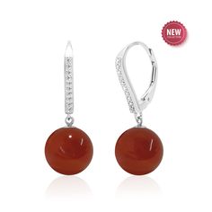 Unleash the fiery allure of our sterling silver carnelian earrings, the perfect 17th Anniversary jewelry gift for women. Featuring AAA quality 10 mm round dark orange gemstone spheres dangling from cubic zirconia accented lever backs. More than just an accessory, these beauties are imbued with the vibrant energy of the carnelian gemstone, known for its association with passion, creativity, and confidence. STYLE TIP: Pair with matching pendant necklace (priced separately) to complete the look PRODUCT INFORMATION -  METAL: Sterling Silver (Plated with rhodium for shine, durability and a tarnish resistant finish) -  LENGTH: 1.1 Inches / 28 mm -  WIDTH - 0.4 Inch / 10 mm -  DROP LENGTH - 1 Inch / 25 mm -  BACKING - Lever Back GEMSTONE -  TYPE: Carnelian -  SHAPE - Round Sphere -  CREATION - Na Elegant Carnelian Dangle Earrings, Elegant Carnelian Drop Earrings, Elegant Carnelian Earrings, Elegant Carnelian Earrings For Gift, Elegant Carnelian Earrings Gift, Elegant Orange Carnelian Earrings, Elegant Round Orange Jewelry, Elegant Orange Jewelry For Gifts, Elegant Orange Round Jewelry