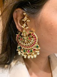 Ruby Fine Kundan Chaandbalis | Kundan Earrings | Kundan Jewelry | Indian Jewelry | Sabyasachi Jewelry | Bollywood Earrings Making Time 10 to 12 days We bring you casual as well as party wear jewelry which comes with an attractive design and helps in boosting your style factor. A classic fusion of exquisite craftsmanship and elegance, this jewelry tries to make you look graceful and stylish when paired with your attire. It goes well with modern and traditional outfits.  These Earrings are made of Cheap Kundan Earrings, Luxury Kundan Earrings For Engagement, Cheap Chandbali Earrings With Latkans, Luxury Bollywood Earrings With Stone Work, Luxury Bollywood Style Meenakari Earrings, Luxury Kundan Chandbali Pearl Earrings, Luxury Festive Kundan Chandbalis, Luxury Stone Work Chandbalis For Wedding, Luxury Traditional Chandbalis With Stone Work