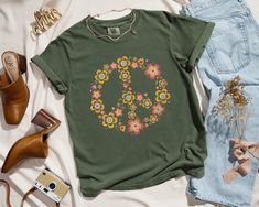 ✨ Flaunt your unique style with our aesthetic tees! This selfie-worthy design is printed with eco-friendly inks on the bestselling 100% cotton Comfort Colors t-shirt, an oversized top that feels like a well-worn favorite the moment you put it on. ✨ SIZING * Please refer to the size chart in the listing photos for exact measurements. * Better yet, simply lay out your favorite t-shirt and measure it, comparing it to our size chart. * This is a relaxed fit unisex sized shirt, which means that those Trendy Green T-shirt With Sublimation Print, Hippie Cotton T-shirt With Graphic Print, Cotton Hippie T-shirt With Graphic Print, Hippie Style Screen Print T-shirt, Hippie Cotton Screen Print T-shirt, Hippie Cotton T-shirt With Screen Print, Cotton Hippie T-shirt With Screen Print, Green T-shirt With Front Print For Spring, Hippie Cotton Tops With Letter Print