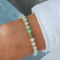 "Chrysoprase opens, activates and energises the heart and sacral chakras, balances yin-yang energy, and brings Universal energy into the physical body. It induces deep meditative states, and imparts a sense of being a part of the divine whole. Chrysoprase promotes love of truth. D E T A I L S △ Handmade in Canada △ Genuine Chrysoprase 4.5-5mm △ 14K gold filled accents △ Gemstones are 100% genuine  L E N G T H Please measure your wrist then add 1/2\" to find your best fit. Select chosen size in t Green Amazonite Beaded Bracelets As Gift, Green Amazonite Gemstone Beaded Bracelets, Everyday Green Jade Beaded Bracelets, Everyday Green Aventurine Beaded Bracelets, Everyday Green Aventurine Beaded Bracelet, Chrysoprase Jewelry, Yang Energy, Yin Yang, Gold Filled