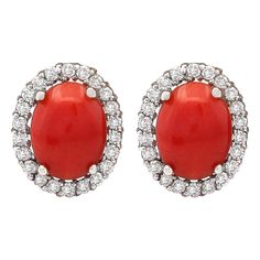 Stamped: 14K White Gold Total Earrings Weight: 2.2 Grams Total Natural Coral Weight is 2.30 Carat (Measures: 8.00x6.00 mm) Color: Red Total Natural Diamond Weight is 0.65 Carat Color: F-G, Clarity: VS2-SI1 Face Measures: 12.10x10.10 mm Sku: [703713W] Art Deco Drop Earrings, Coral Drop Earrings, White Gold Drop Earrings, Emerald Diamond Earrings, Yellow Gold Diamond Earrings, Red Coral Earrings, Gold Diamond Hoop Earrings, White Gold Diamond Earrings, White Gold Hoops