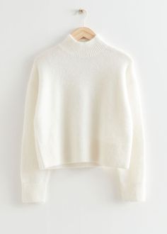 Cropped mock neck knit sweater featuring a cropped, boxy silhouette.– Ribbed collar, cuffs and hemline– Certified according to the Responsible Mohair Standard (CU810300)– Certified according to the Responsible Wool Standard (CU810300)Length of sweater: 51cm / 20.1" (Size S) Camel Winter Coat, Fashion Mumblr, Wineries Outfit, High Boots Outfit, Trouser Outfits, Ribbed Turtleneck Sweater, Cashmere Turtleneck, Sweater White, Fall Winter 2024