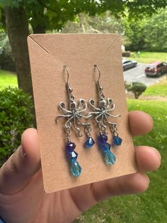 Octopus charm drop earrings with blue glass dangling drips Octopus Earrings, Droplet Earrings, 3d Projects, Blue Glass, Octopus, Jewelry Earrings Dangle, Etsy Earrings, Dangle Drop Earrings, Dangle Earrings