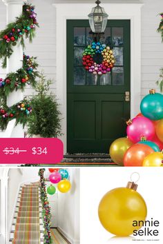 the front door is decorated for christmas with ornaments and garlands on it, along with an ornament