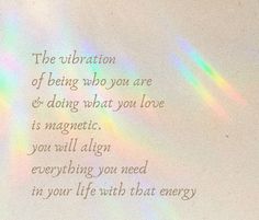 a poem written in white with rainbow colored light coming from the top and below it