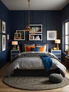 a bedroom with blue walls and wooden floors