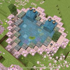 an aerial view of a pool surrounded by pink flowers