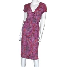 New With Tag. Faux Wrap Style. Paisley Print. Side Tie On Waist. Deep Neckline. Anti- Wrinkle. Size 12. Color: Pink And Orange. Length From Shoulders To Hem: 44”. Pit To Pit: 30”. Waist : 34”-36”. Stretchy. Fitted Short Sleeve Paisley Print Dress, Casual Fitted Midi Dress With Paisley Print, Fitted Knee-length Paisley Print Midi Dress, Pink Paisley, Deep Neckline, Dress 12, Ann Taylor Dresses, Faux Wrap Dress, Anti Wrinkle