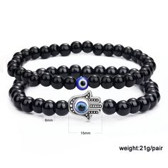 This beautiful 6cm Black Glass White Turquoise Colored Glaze Beaded Devil's Eye Bracelet Set is the perfect gift for your special someone. This gorgeous set includes a beaded bracelet made with natural black glass and white turquoise beads, perfect for any occasion. The unique design is a statement piece that adds an elegant touch to any outfit. Not only that, but this minimalist bracelet is highly customizable, making it the perfect gift for a girlfriend, wife, daughter, mother, sister, aunt, o Casual Beaded Bracelets With Black Beads As Gift, Evil Eye Bead Bracelet Gift, Casual Black Beads Stretch Bracelet Gift, Casual Black Beads Stretch Bracelet, Black Round Beads Jewelry Fashion Accessory, Black Round Beads Fashion Jewelry, Turquoise Beaded Bracelets With Black Beads As Gift, Black Round Beaded Fashion Jewelry, Handmade Black Crystal Bracelet Gift