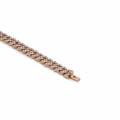 Old-school style gets a modern era update with this Diamond Cuban Link Bracelet. Make a statement in bold 14-karat rose gold links adorned with 6.47 carats of white diamonds. From its diamond-laden clasp to its hefty links, no detail has been overlooked in this new rendition of one of the most iconic jewelry styles. Details14K Rose Gold6.47 Carats of DiamondsLength: 8 Inches Elegant Diamond Curb Chain Bracelet, Elegant Diamond Chain Bracelet With Curb Chain, Luxury Diamond Bracelet With Curb Chain, Elegant Diamond Bracelet With Curb Chain, Rose Gold Diamond Tennis Bracelet With Jubilee Style, Elegant Curb Chain Bracelet With Cubic Zirconia, Diamond Curb Chain Bracelets For Formal Occasions, Elegant Cuban Link Bracelet With Cubic Zirconia, Elegant Cuban Link Tennis Bracelet