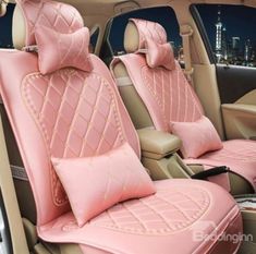 pink car seat covers with bows and diamond embellishments on the front seats