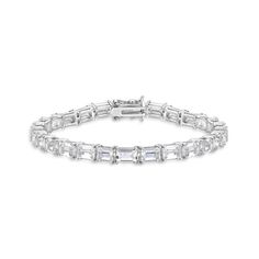 She'll be excited to wear this stunning tennis bracelet with her evening attire. Created in sterling silver, this choice showcases a row of 6.0 x 4.0mm baguette-cut lab-created shimmering white sapphires. Polished to a bright shine, this 7.25-inch bracelet secures with a tongue and groove clasp. Classic Silver Baguette Diamond Bracelet, Formal Baguette Cubic Zirconia Tennis Bracelet, Anniversary Baguette Cut Tennis Bracelet, Anniversary Tennis Bracelet With Baguette Cut, Classic White Tennis Bracelet With Baguette Diamonds, White Baguette Cut Tennis Bracelet, Formal Baguette Cut Tennis Bracelet With Baguette Diamonds, Classic Tennis Bracelet With Baguette Cut, White Tennis Bracelet With Baguette Cut And Prong Setting