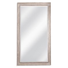 a wooden framed mirror on a white wall with a light brown frame and wood trim