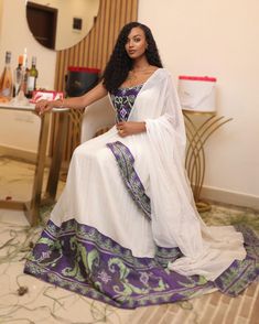 Beautiful Habesha Libs Hndwoven Habesha Kemis Habesha Dress Eritrean Dress ሀበሻ ቀሚስ ሀበሻ ልብስ Eritrean Dress, Ethiopian Clothing, Habesha Dress, Ethiopian Dress, Habesha Kemis, Handwoven Fabric, Cultural Heritage, Intricate Designs, Wide Sleeves