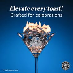 a martini glass with flames in it and the words elevated every toast crafted for celebrations