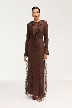 Indulge in the exquisite elegance of the Adriana Waterfall Mesh Maxi Skirt in Brown. Crafted from delicate mesh fabric, this skirt features a cascading waterfall ruffle detail and flattering princess seams. Perfect for making a sophisticated statement at any event or occasion. Model is 5'7" and is wearing size S/44". Please note this garment runs tight. We kindly recommend choosing one size up from your usual size. Cascading Waterfall, Mesh Maxi Skirt, White Dress Formal, Dresses Flowy, Nikkah Dress, Engagement Dresses, Princess Seams, Dress Satin, Kids Outerwear