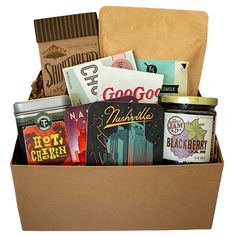 an open box filled with snacks and condiments