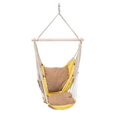 a yellow hammock chair hanging from a wooden frame with two pillows on it