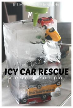 an ice block with cars and trucks on it that says icy car rescue science is in story play