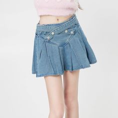 Indulge in the sophistication and elegance of our Women's Preppy Pleated Denim Skirt. Crafted with precision and attention to detail, this skirt features delicate pleats and the finest denim fabric for a luxury feel. Elevate any outfit with this exclusive piece, perfect for the modern woman. Features: -Solid Color -Pleated Design -Regular fit -Preppy style High Waist Pleated Cotton Denim Skirt, High Waist Pleated Denim Skirt In Cotton, High Waist Cotton Denim Pleated Skirt, High-waist Cotton Pleated Denim Skirt, Chic Pleated Fitted Denim Skirt, Chic Short Denim Blue Skirt, Chic Short Length Denim Blue Skirt, Denim Pleated Skort In Short Length, Denim Pleated Skort, Short Length