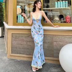 Dance the night away in our May V-Neck Floral Maxi Slip Dress, featuring a slim fit and playful printed design. Go backless and sleeveless for a resort-style vacation look that's sure to turn heads. Available in blue and orange from our LaPose Spring-Summer Collection. May V-Neck Floral Maxi Slip Dress Sleeveless Backless Slim Fit Printed Romantic Resort Style, French Style, Vacation Dress Available in Blue and Orange Colors LaPose Spring-Summer Collection Summer Prints Fashion, Casual Party Outfit, Lace Halter Dress, Vacation Dress, Long Midi Dress, Maxi Slip Dress, Backless Maxi Dresses, Suspender Dress, Long Summer Dresses