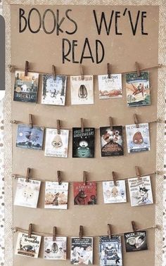 a bulletin board with books on it that says books we've read hanging from clothes pins