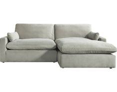 a white couch with pillows on it