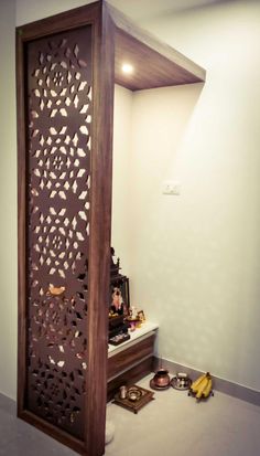 a room divider made out of wood with an intricate design on the top and bottom