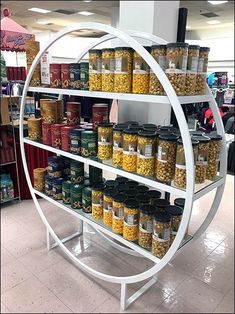 the shelves are filled with different kinds of food