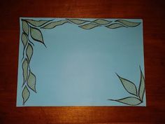 a piece of paper with leaves on it