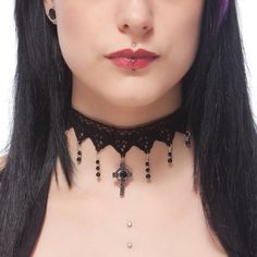 The Immortal gothic lace choker features a natural gemstone Black Onyx celtic cross complimented by shimmering jet Black Swarovski crystal beads. The main pendant is an ornate Celtic cross set with a natural gemstone Black Onyx Cabochon. From the front 6 points of the lace flow strands of shimmering jet black Swarovski crystal beads finished off with a 4mm round Black Onyx natural gemstone. The lace is finished off securely with an extender chain which allows the necklace/choker to be worn at an Emo Halloween Festival Necklace, Adjustable Black Gothic Body Jewelry, Gothic Adjustable Necklace For Halloween, Gothic Halloween Adjustable Necklace, Gothic Black Crucifix Cross Necklace, Adjustable Black Vampire Necklace, Adjustable Black Vampire Style Necklaces, Gothic Cross Necklace For Festivals, Adjustable Gothic Jewelry For Festivals