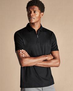 Zip-Neck Jersey Polo - Black | Men's Charles Tyrwhitt Zip-Neck Jersey Polo Shirt - Black Size Large Cotton Black Collared Cotton Polo Shirt, Black Polo Collar T-shirt With Relaxed Fit, Black Moisture-wicking Polo Shirt For Sports, Sports Collared Polo Shirt With Moisture-wicking Fabric, Polo Shirt Outfits, Black Moisture-wicking Polo Collar T-shirt, Charles Tyrwhitt, Shirt Outfits, Lightweight Blazer