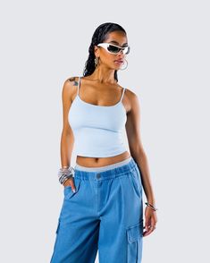 Nothing screams effortless it-girl like this look 👏 This three piece set featuring a blue cami tank top, heather gray mini shorts, and a pair of blue denim parachute pants is the perfect full fit for a relaxed yet chic look 💙 Spring Blue Tank Top For Streetwear, Blue Tank Top For Spring Streetwear, Blue Tank Top For Summer Streetwear, Trendy Denim Tank Top, Summer Blue Streetwear Tank Top, Trendy Denim Blue Short Length Top, Trendy Denim Blue Tank Top For Summer, Trendy Blue Tank Top With Adjustable Straps, Trendy Short Length Denim Blue Top