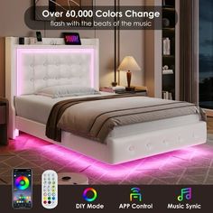 the bed has been made with white leather and is lit up by colorful leds