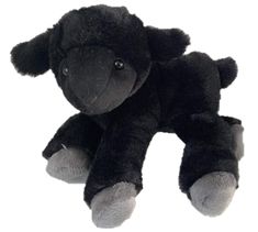 a black stuffed animal sitting up against a white background