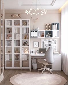 a home office with lots of white furniture and shelves filled with books, papers, and other items