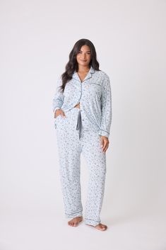 Elevate your sleepwear with our light blue modal pajama set adorned with a mini leopard-floral print. Featuring contrasting piping and a chest pocket, this set combines playful patterns with practical elegance for a restful night’s sleep. This style is made from modal, a fan-favorite sleepwear fabric. Modal is a versatile year-round fabrication that has a smooth, luxe feel. Maternity Pajamas, Blue Air, Sleepwear & Loungewear, Collar Top, Getting Cozy, Pj Sets, Contrast Trim, Fabric Color, Chest Pocket