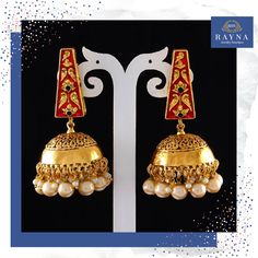 Pearl Jhumka earring complements all dresses and can be worn as a statement piece to any occasion. These earrings are unique and exhibit beauty in traditional style. Shop this style today ! #pearl #jhumka #jhumkaearring #statementearring #earring #jewelry #indianjewelry #indianjewellery #bellearring #pearlearring #june #junebirthstone #junebirthday #gift #junegift #birthdaygift #styleguide #fashion #ethnicjewelry #bohoearring #weddingjewelry #indianwedding #indiabride #desiwedding #desibride Ceremonial Intricate Design Jhumkas Drop Earrings, Bollywood Chandbali Earrings For Ceremonies, Meenakari Earrings For Puja, Round Shape, Meenakari Round Earrings For Puja, Round Tilla Earrings For Puja, Round Meenakari Earrings For Puja, Festive Gold Plated Tilla Earrings, Traditional Brass Chandbalis With Meenakari, Meenakari Temple Jewelry Danglers